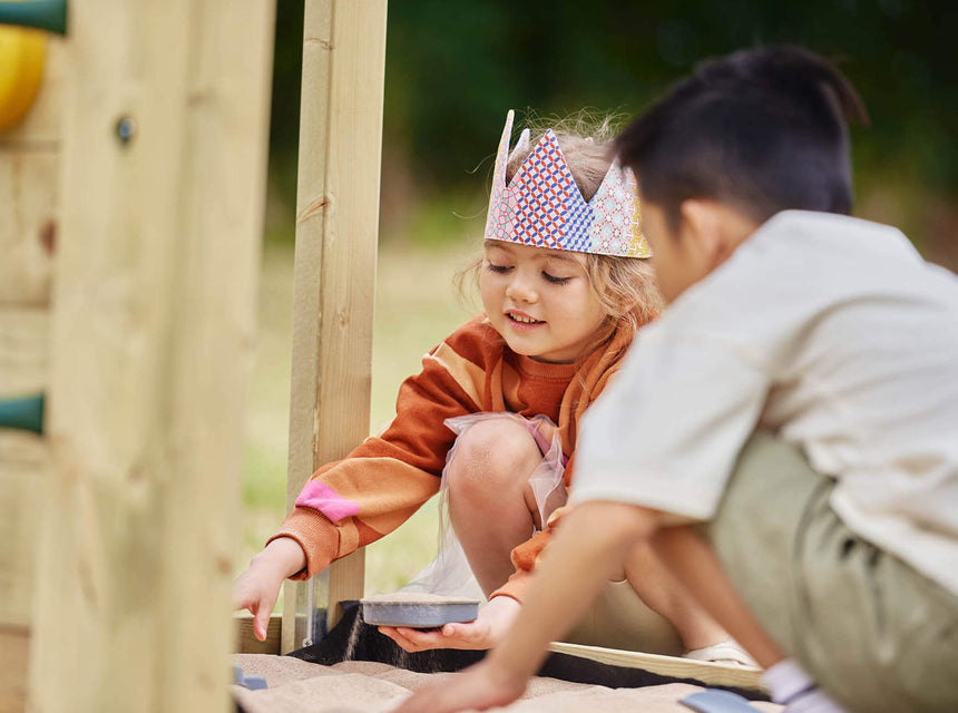 children playing in sandpit